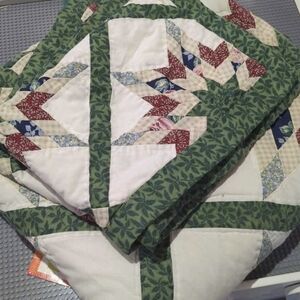Green and Red Patchwork Quilt